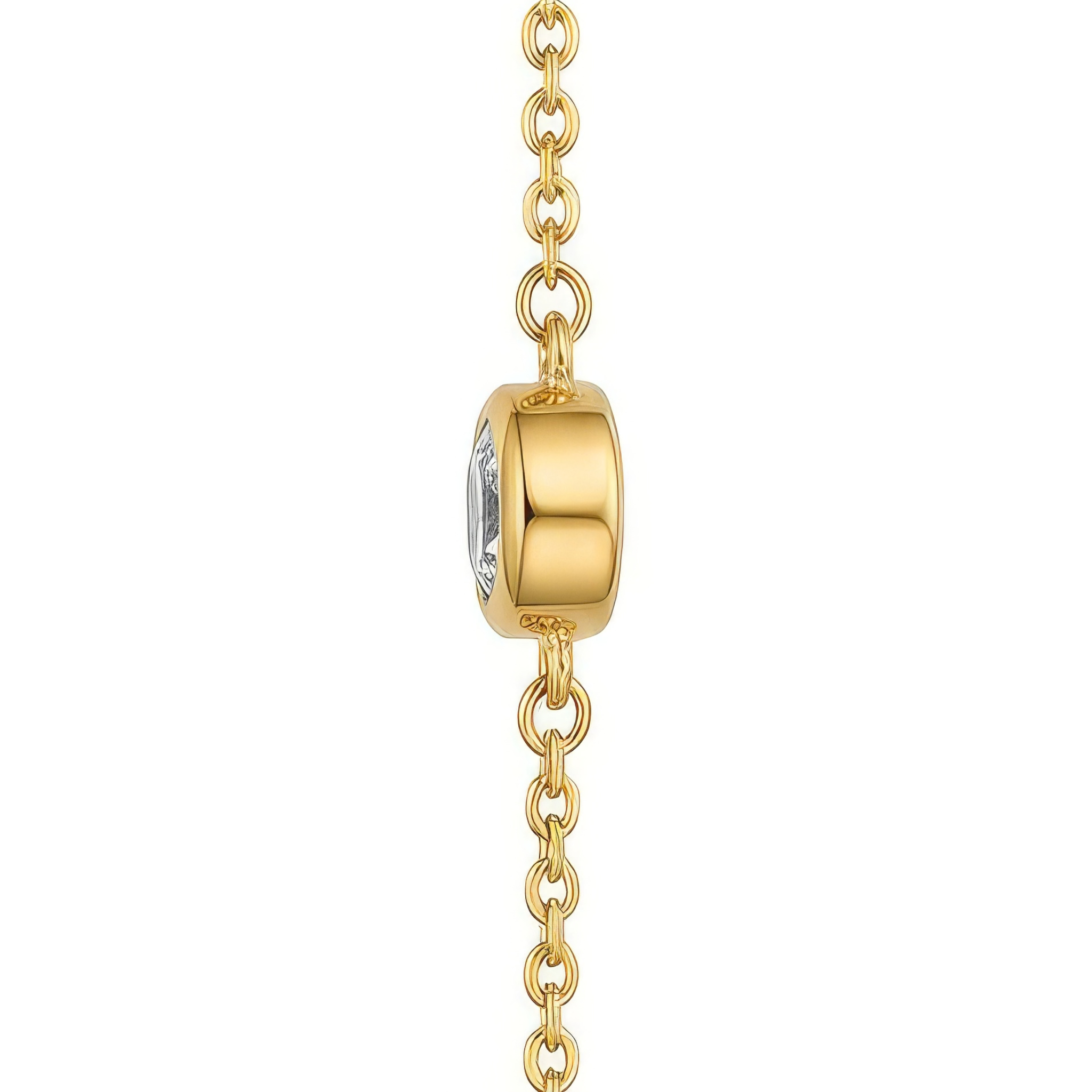 Side view of a clear gemstone on a gold chain against a white background