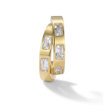 Gold hoop earring with white baguette stones on a white background