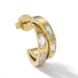Gold hoop earring with white baguette stones on a white background