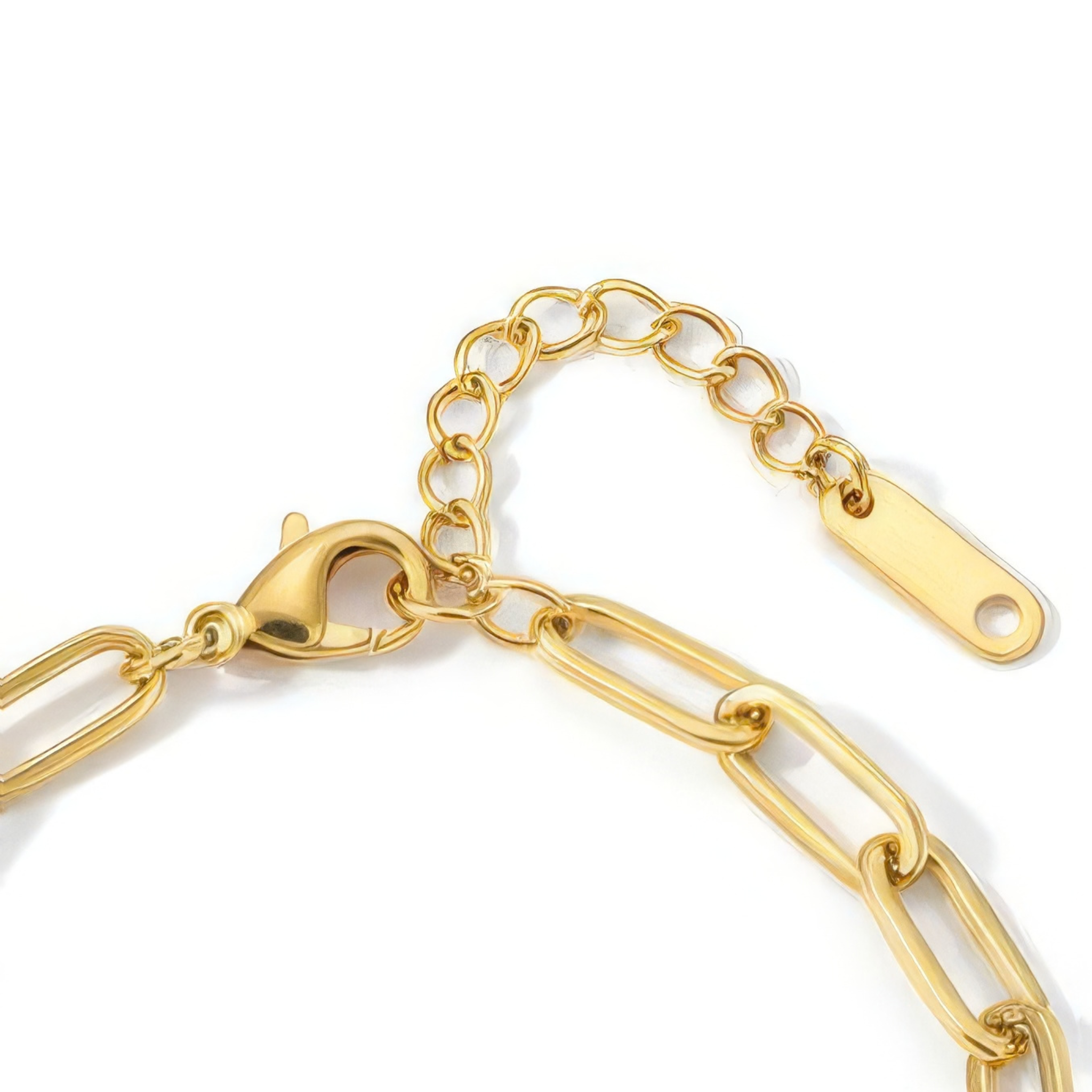 Close up of gold chain bracelet clasp and extender on a white background