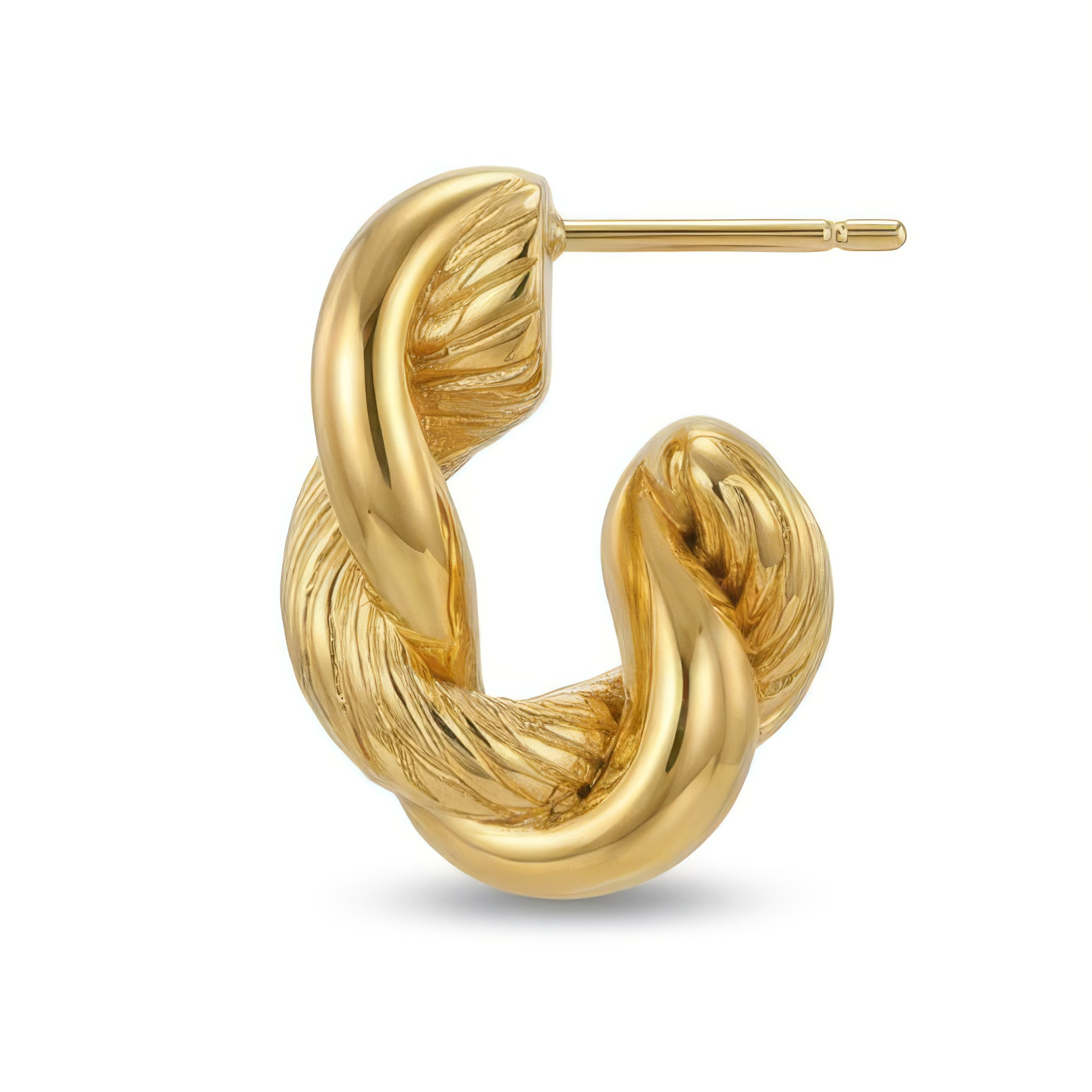 A gold hoop earring on a white background