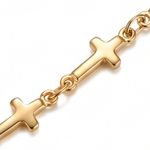 Close up of Mini Crosses Bracelet on a white background.
