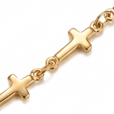 Close up of Mini Crosses Bracelet on a white background.