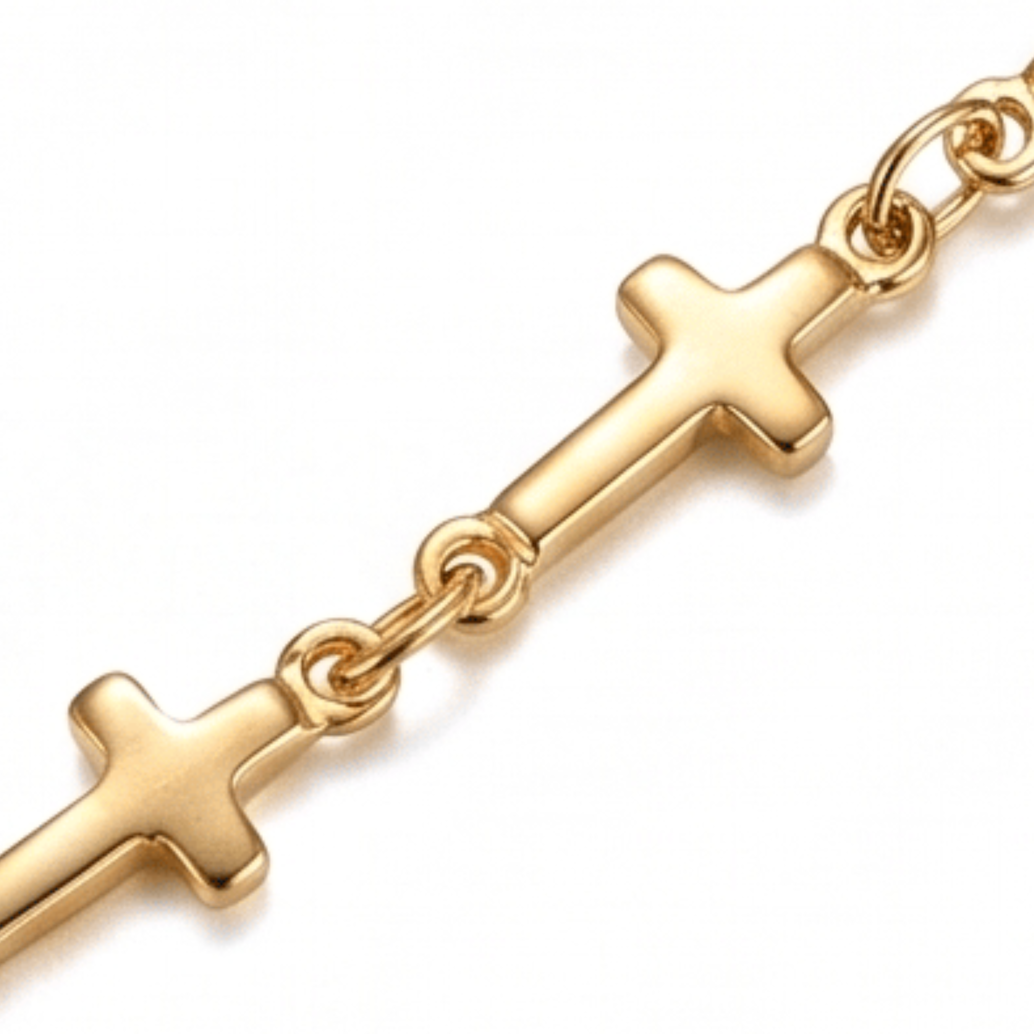 Close up of Mini Crosses Bracelet on a white background.