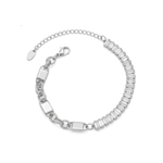 Silver bracelet with clear baguette gemstones on a white background
