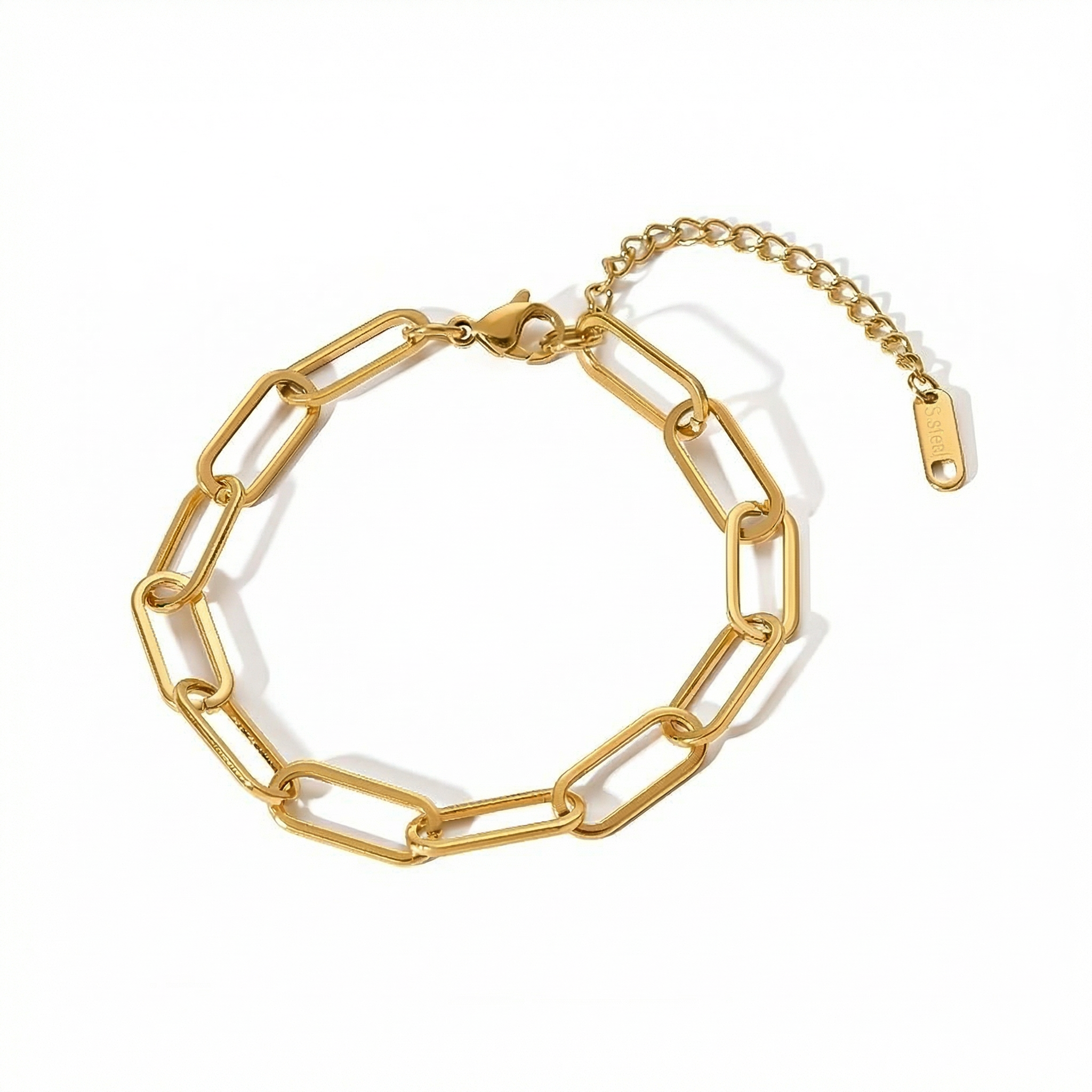 Gold paperclip chain bracelet close-up on white background