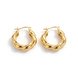 Pair of gold hoop earrings on a white background