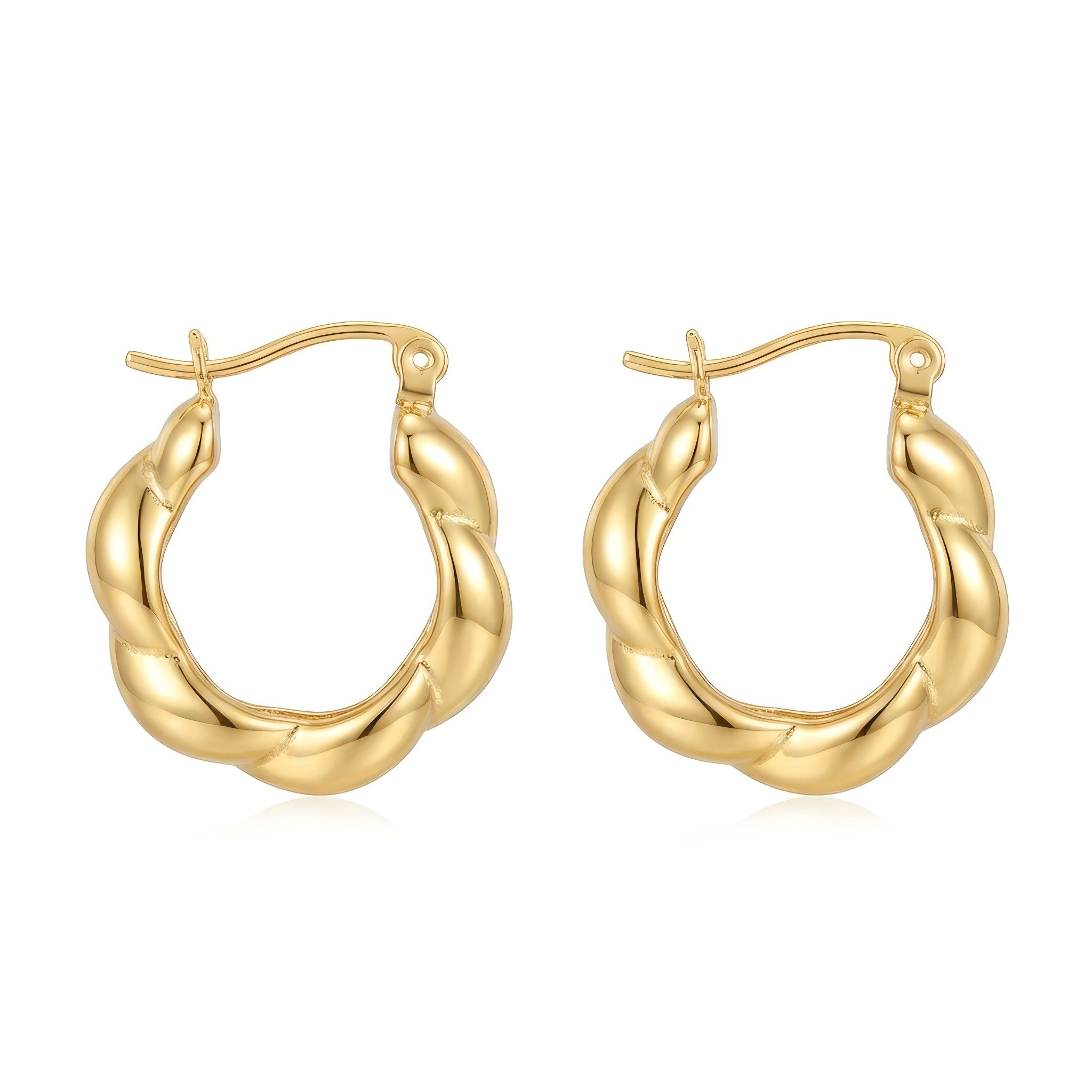 Gold hoop earrings on a white background